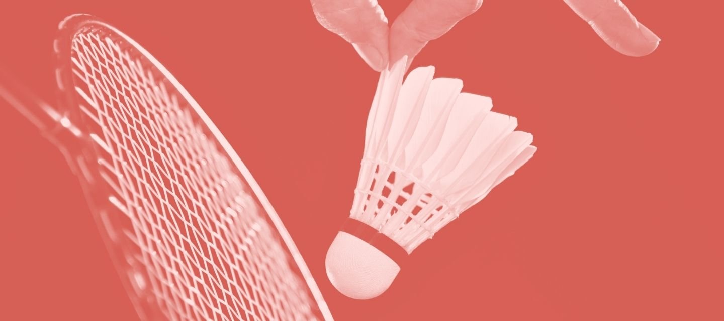 Shuttlecock and racquet representing kitround’s badminton collection.