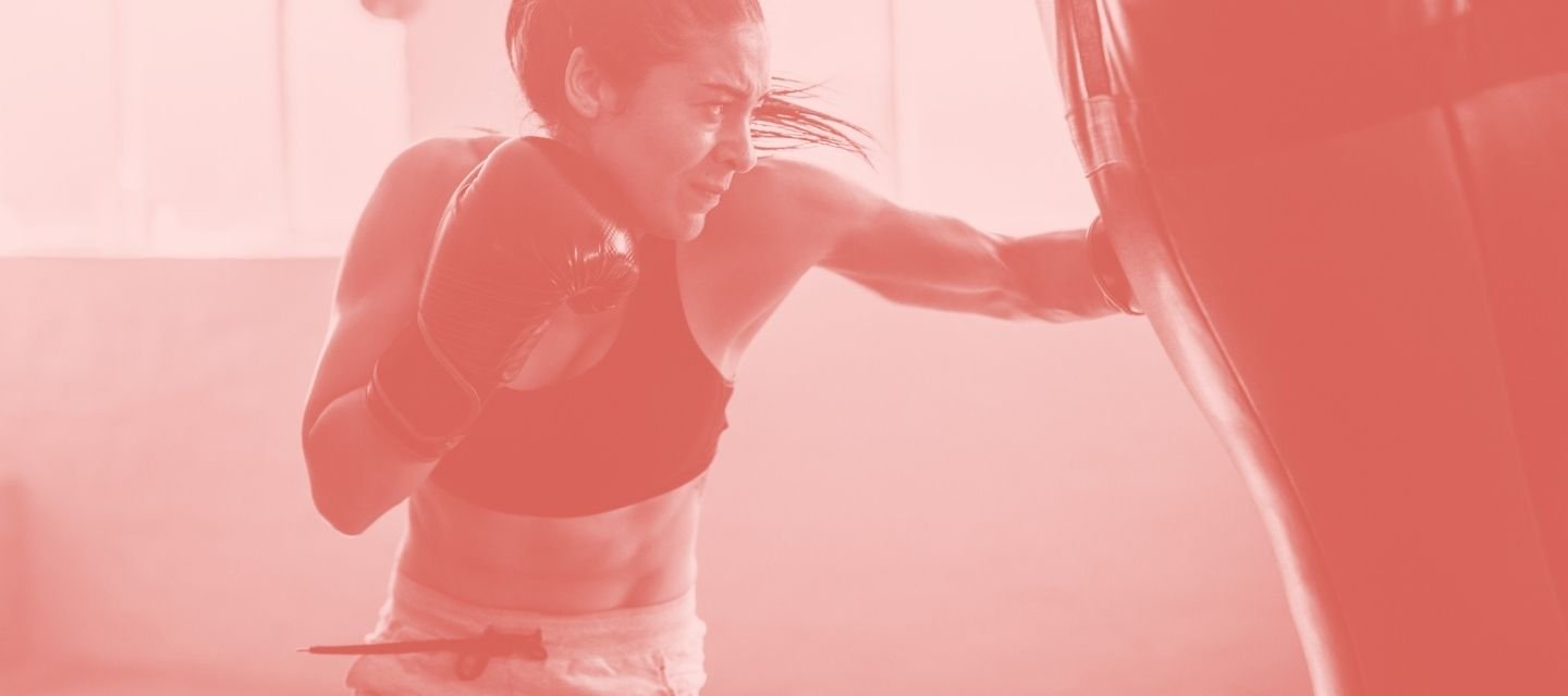 Boxer mid-punch using kit from kitround’s reused equipment selection.