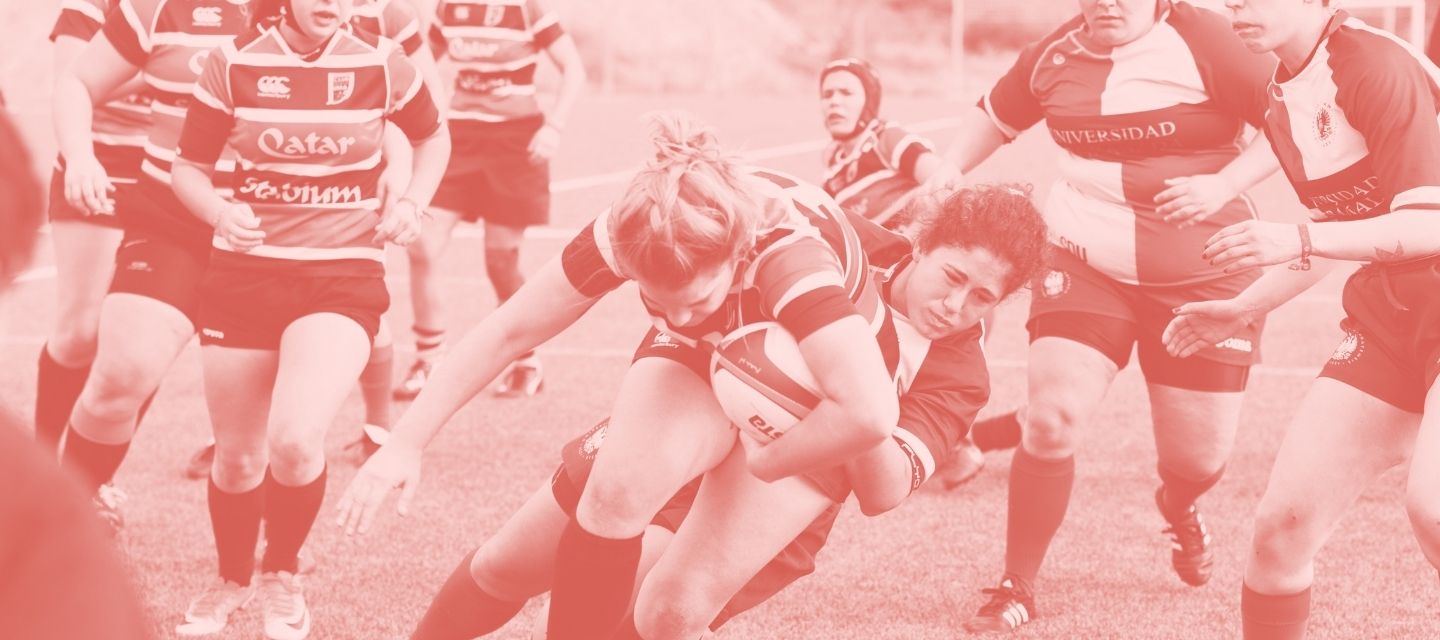Rugby players tackling in gear from kitround’s sustainable collection.