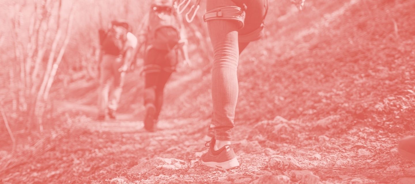 Close-up of hiker on trail in second-hand gear from kitround.
