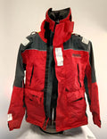 Front view of Musto Performance sailing jacket in red and dark grey with zipped front and Velcro closures