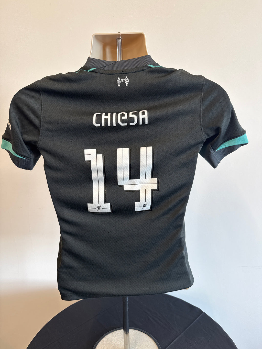 Back view of Liverpool kids football shirt with Chiesa and number 14