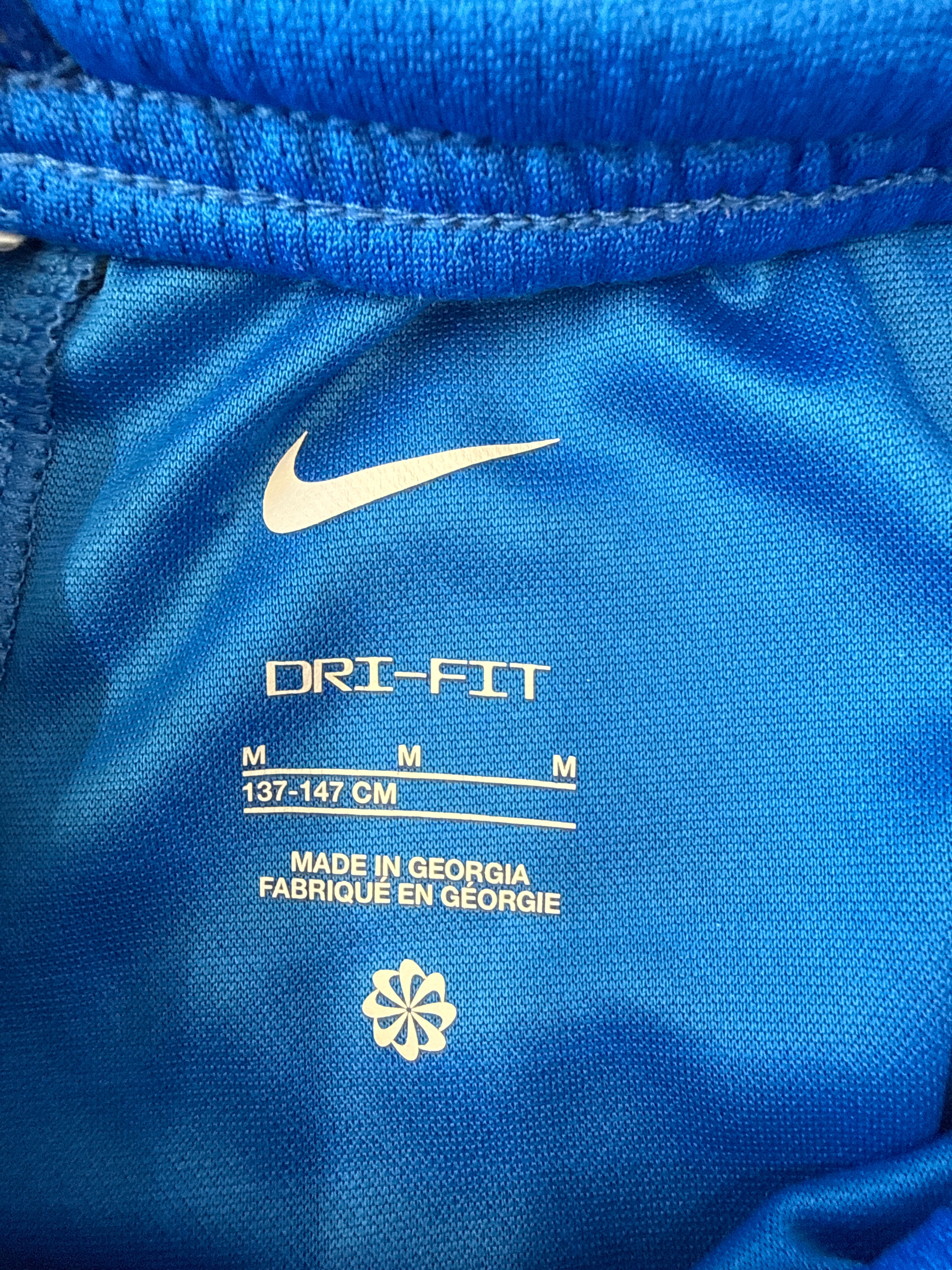 Close-up of size and Dri-FIT branding inside Nike Chelsea kids' football shorts