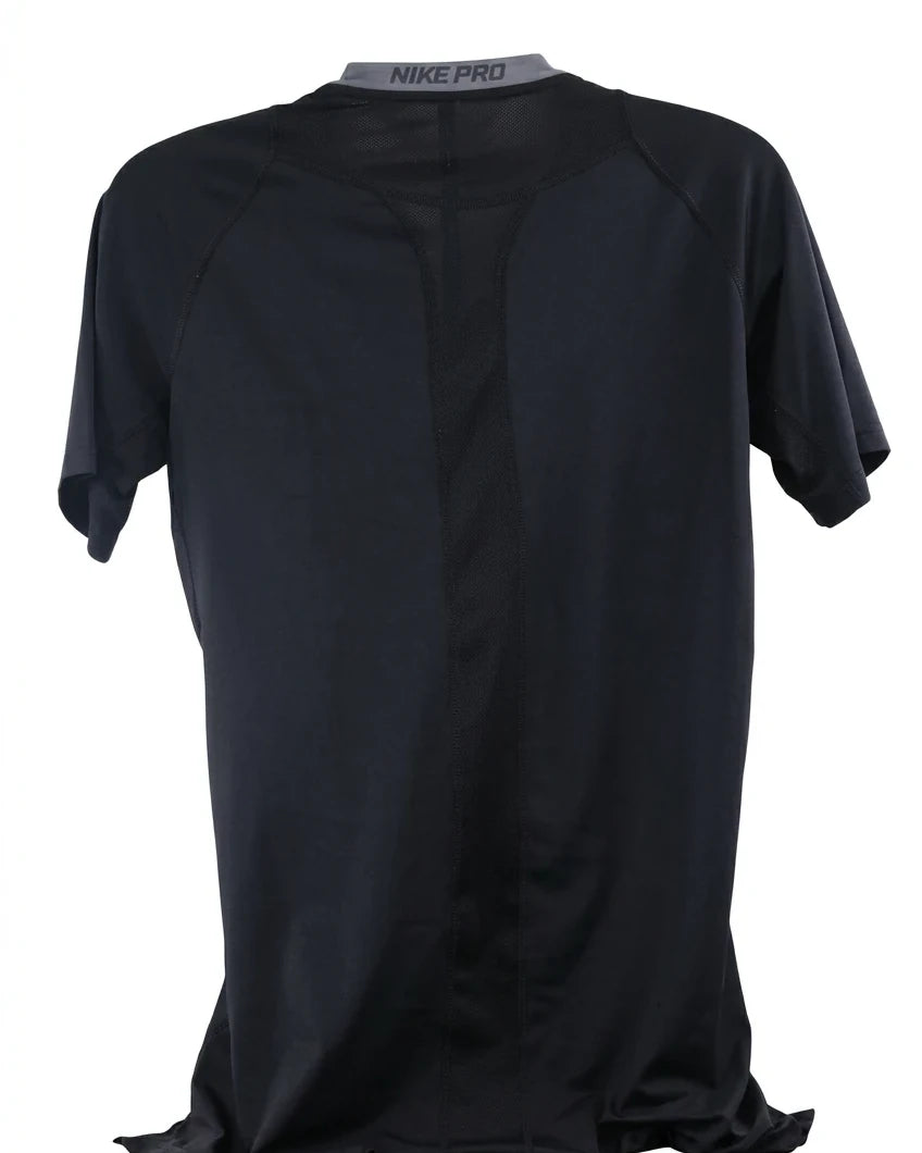 A rear view of a black Men's Nike Pro Dri-Fit short-sleeved compression t-shirt, showing the 'NIKE PRO' text on the grey collar band, set against a clean white background.