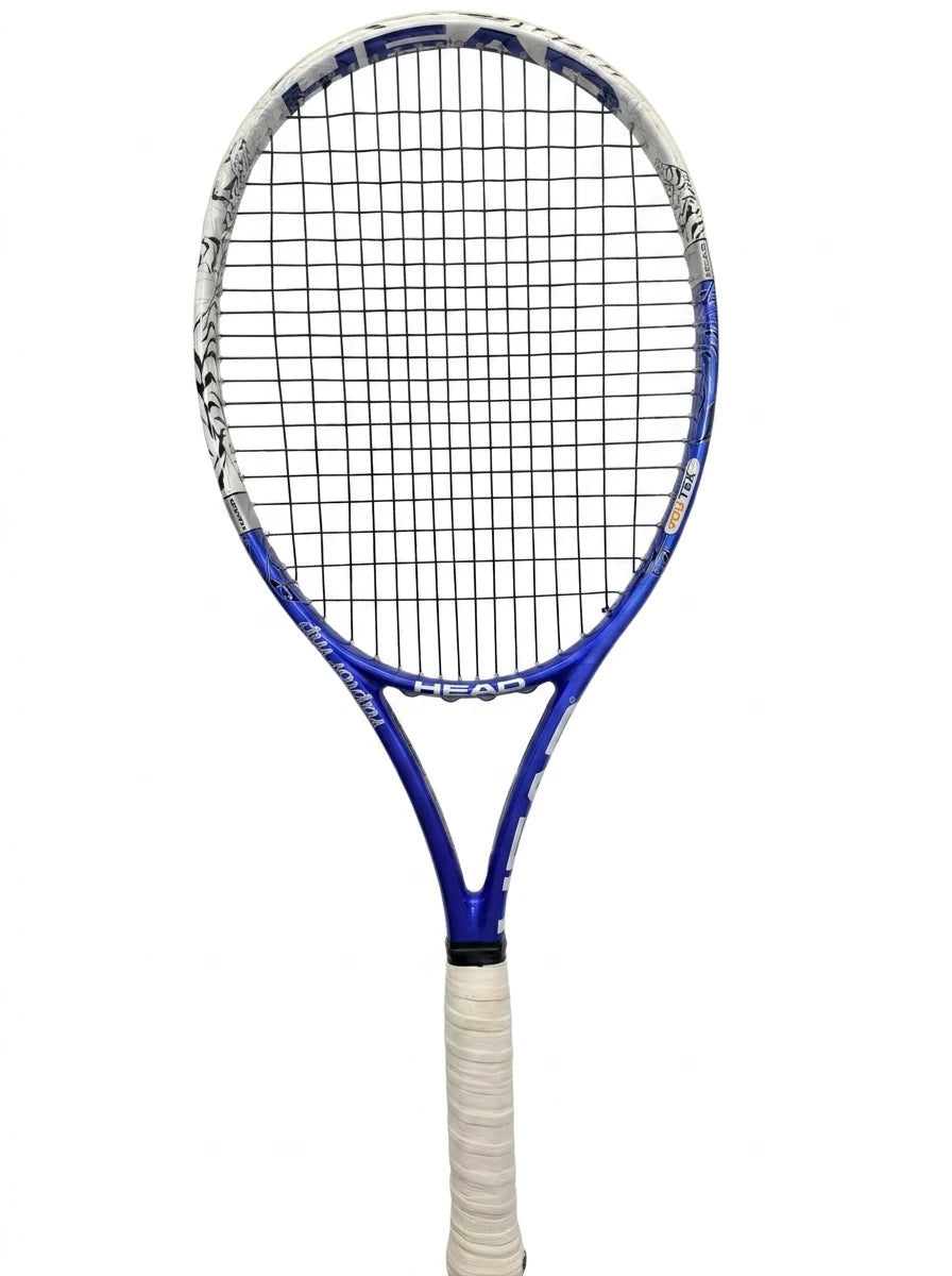 Enhanced Head Raptor MP tennis racket in blue with white grip against white wall