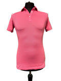 Front view of pink women's golf polo shirt with white details