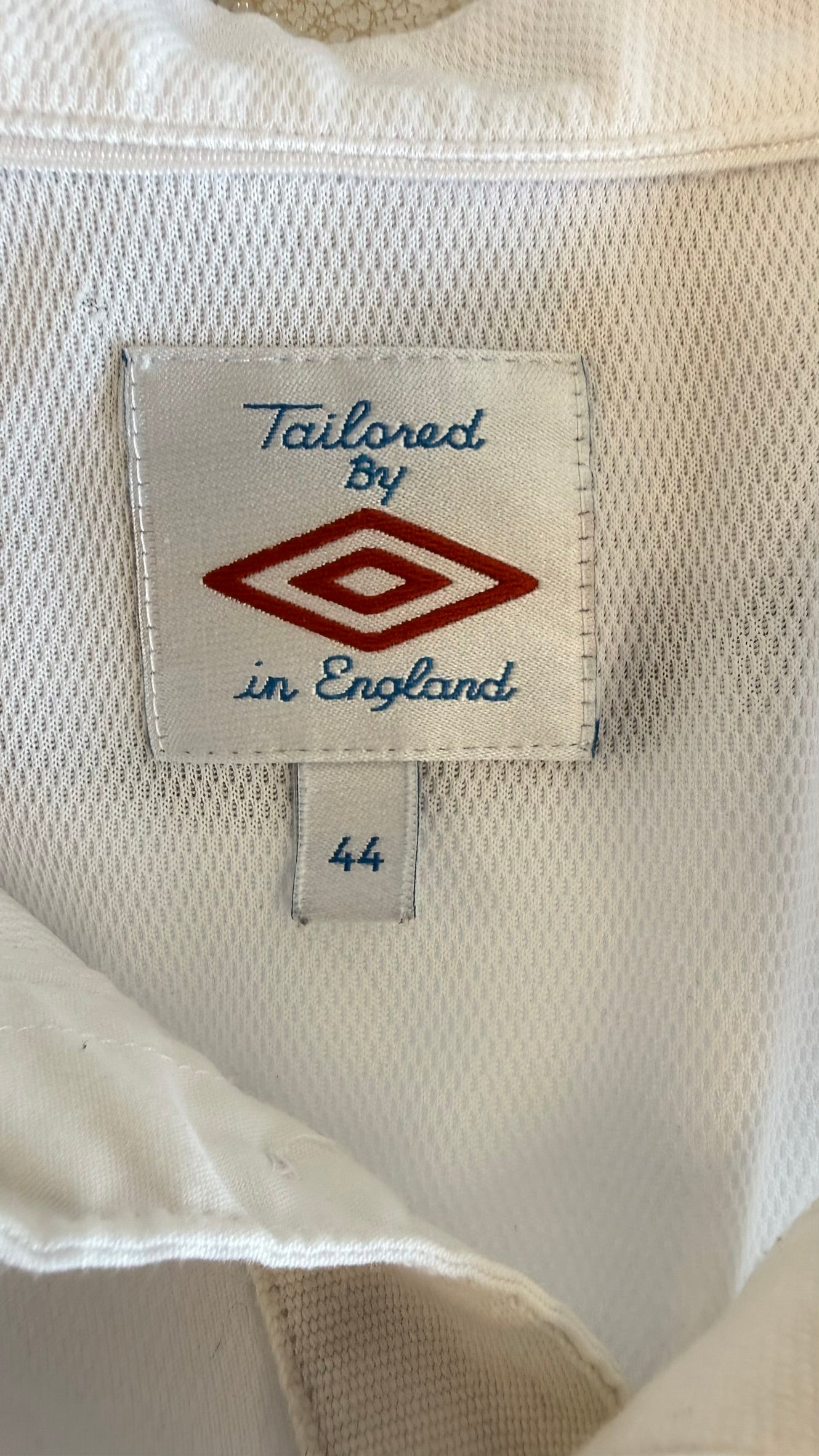Umbro 'Tailored By in England' label with size 44
