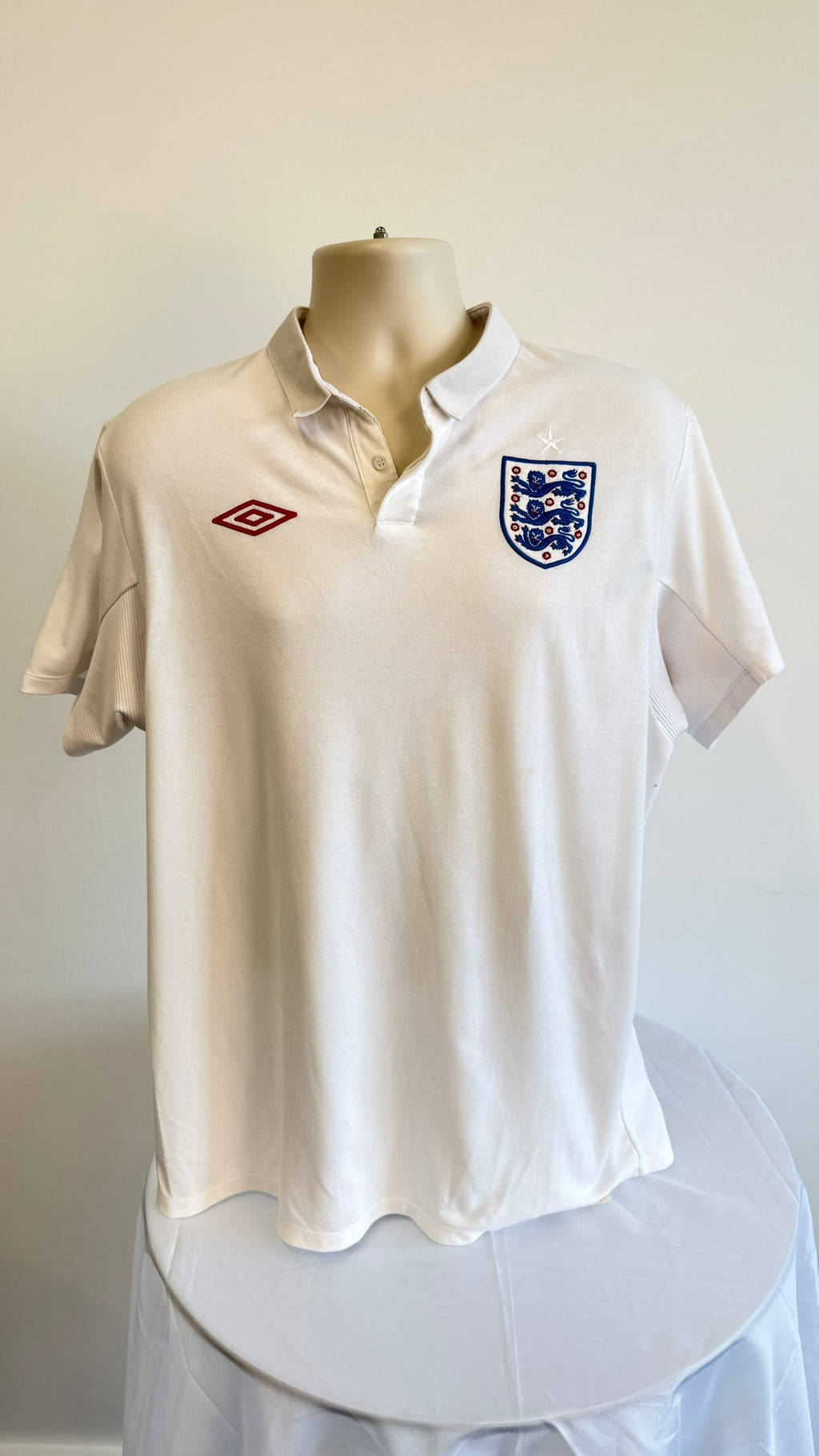 Front view of Umbro England white retro football shirt XL