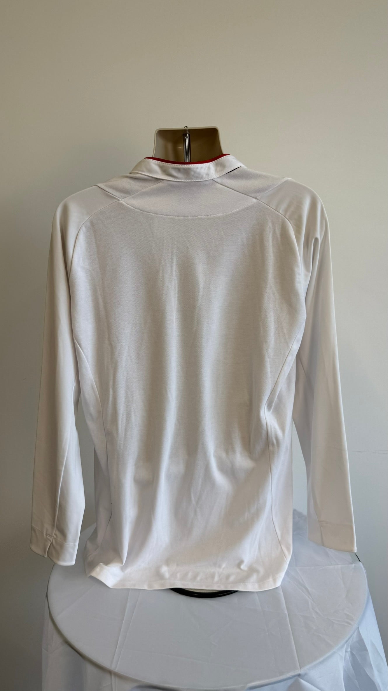 Back view of white long sleeve England football shirt by Umbro
