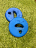 Two blue circular Beco water floats with ergonomic grips on green grass