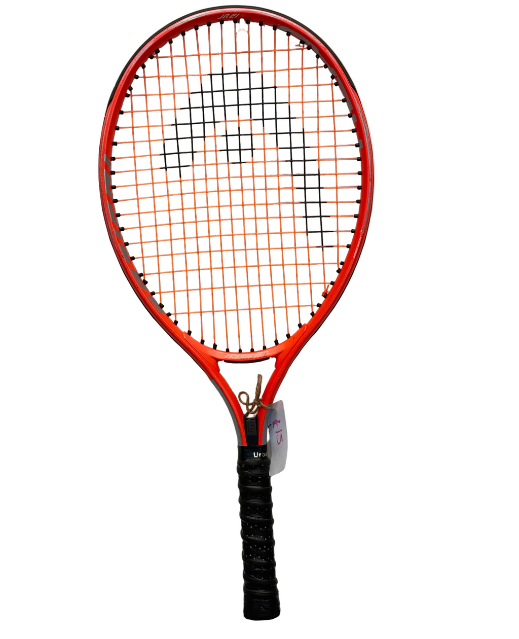 Full view of Head Junior red tennis racket with black grip hanging on wall