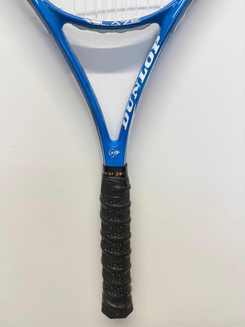 Handle and throat of Dunlop Blaze C-100 tennis racket