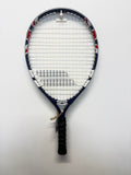 Full-length Babolat blue kids tennis racket hanging on wall