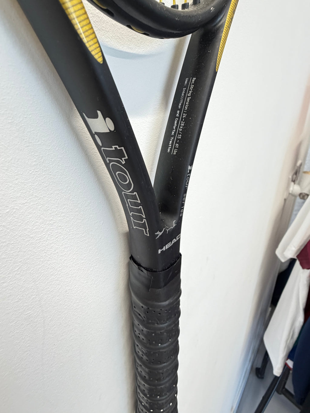 Side view of Head i.Tour tennis racket showing branding and grip