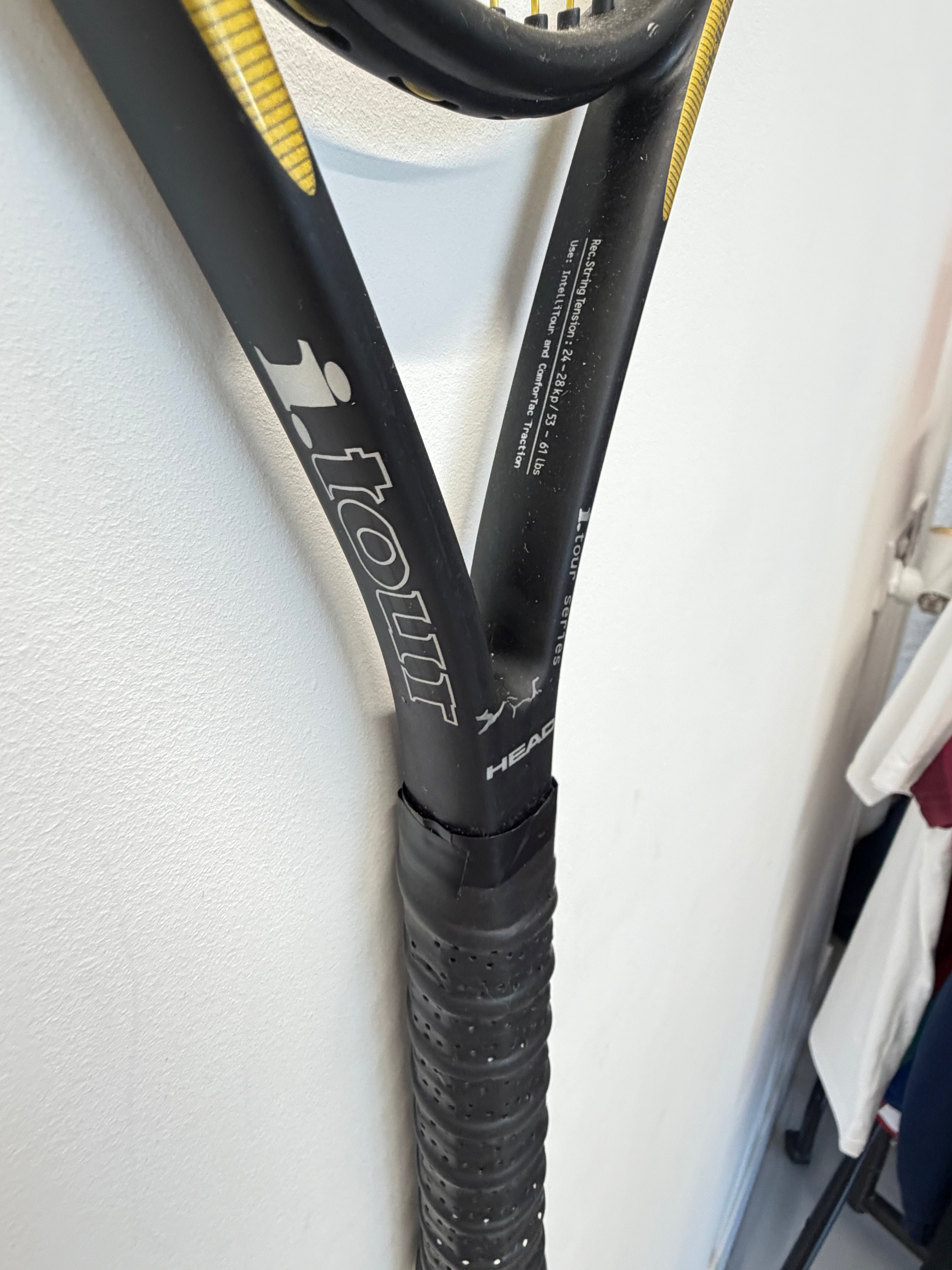 Side view of Head i.Tour tennis racket showing branding and grip