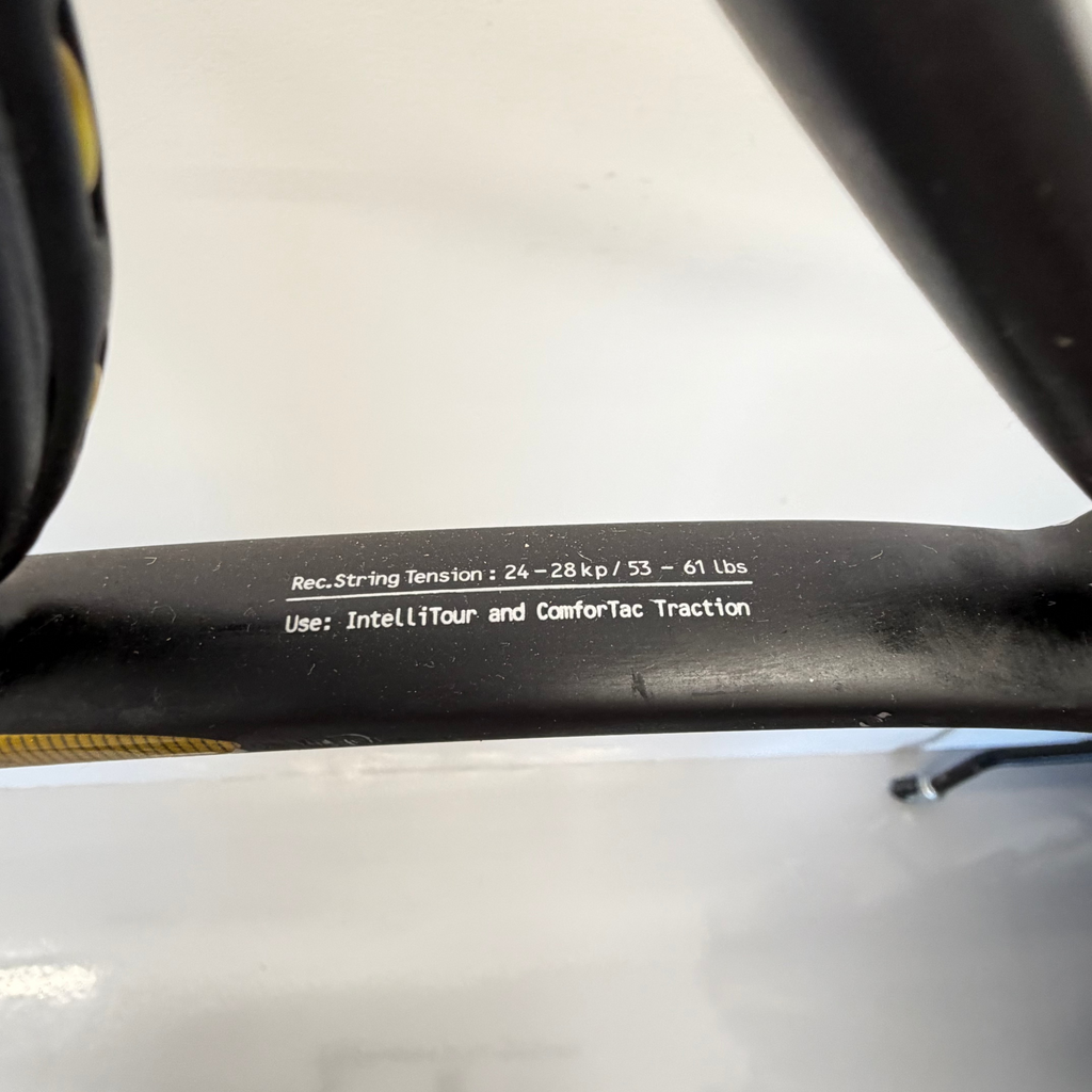 Close-up of Head i.Tour tennis racket recommended string tension and use