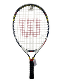 Wilson Steam 23 inch tennis racket hanging on a wall, showcasing its full multi-colour frame and red logo