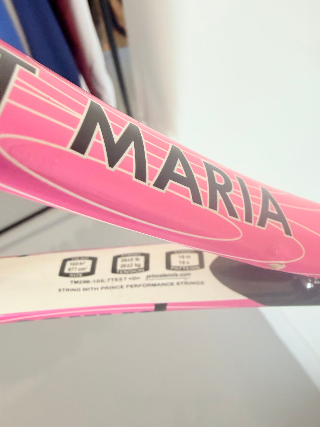 Close-up of Prince TT Maria tennis racket model details and pink design
