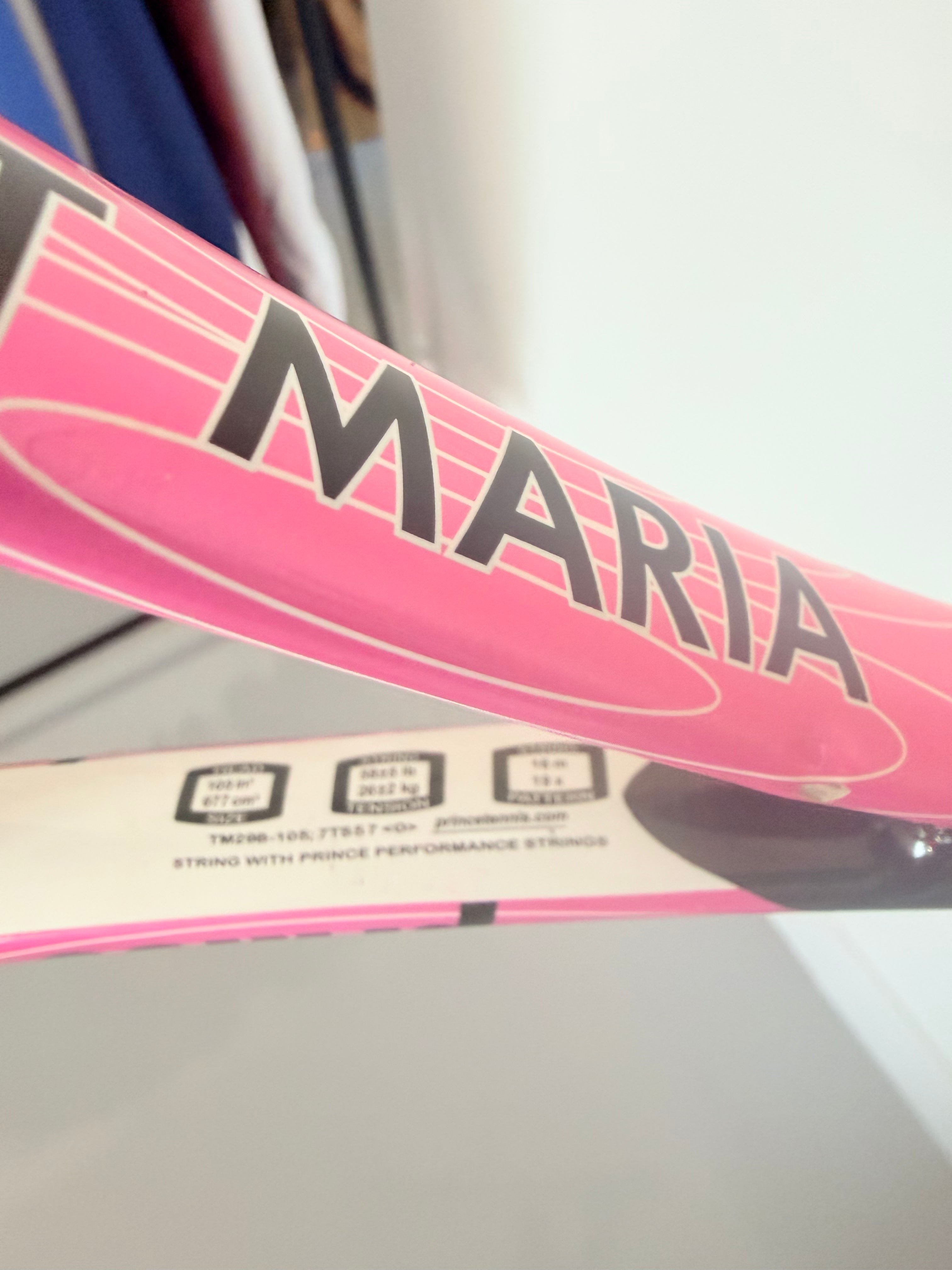 Close-up of Prince TT Maria tennis racket model details and pink design