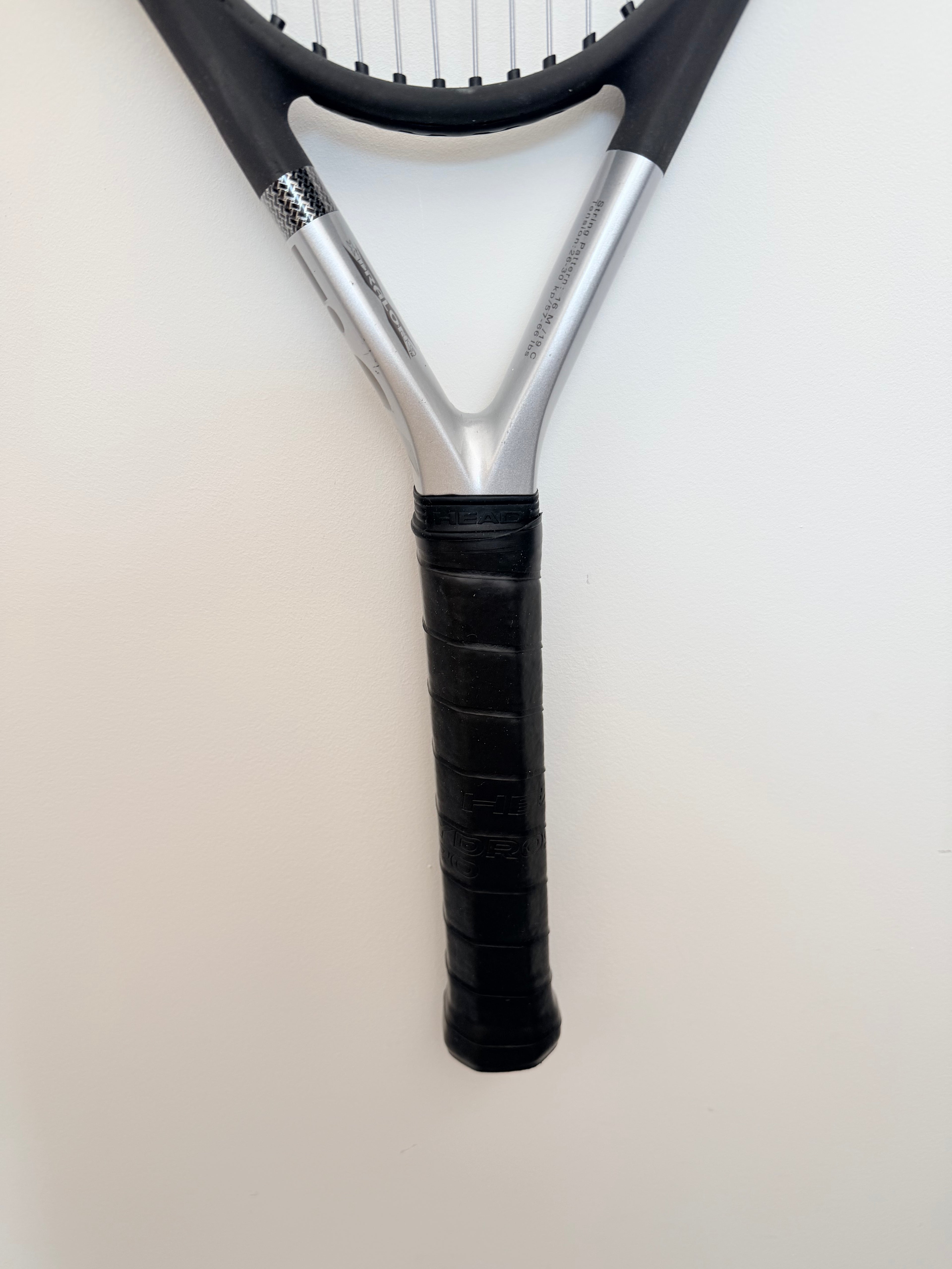 Head Ti.S6 tennis racket full view of black grip and handle