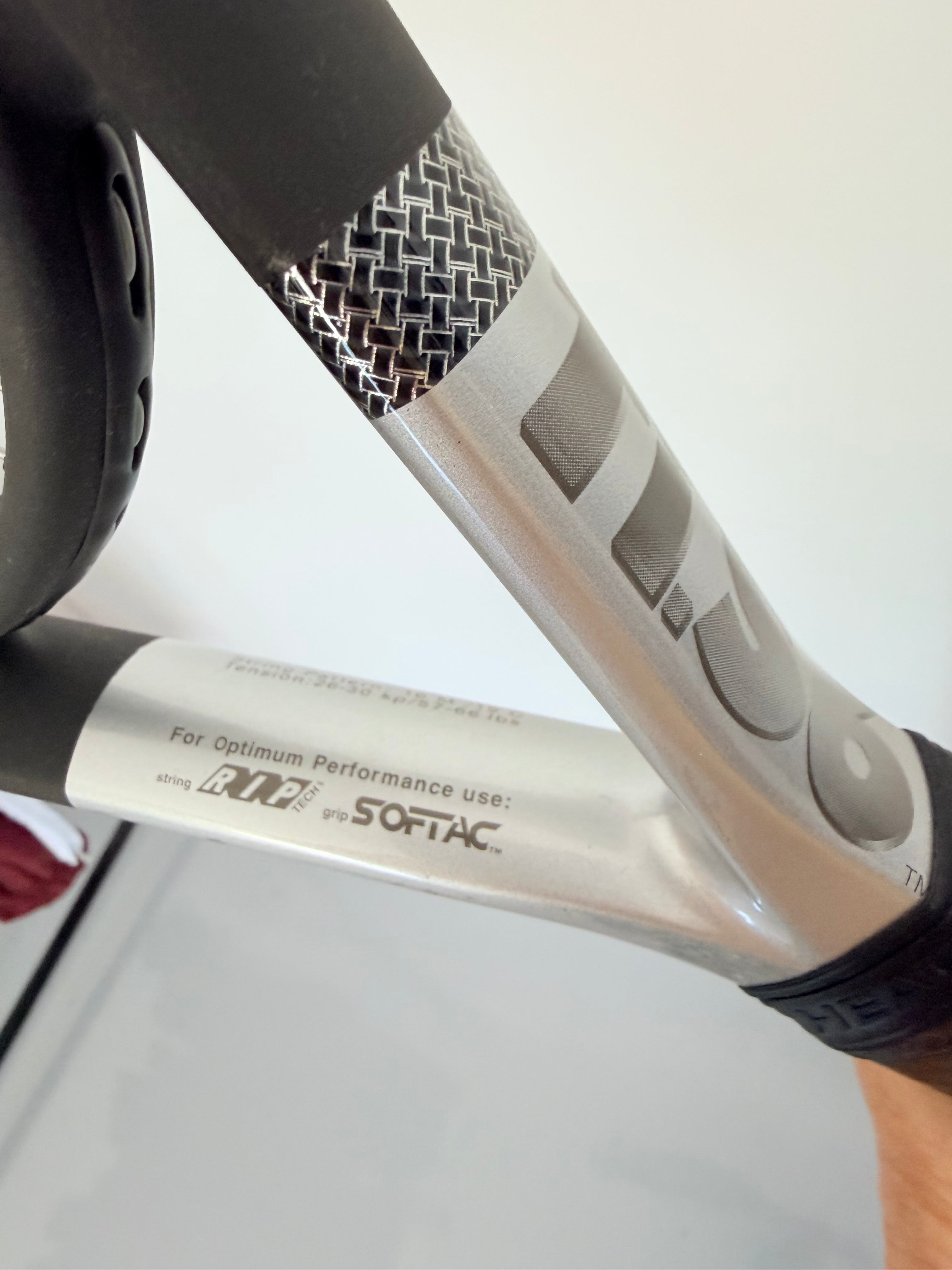 Side shot of Head Ti.S6 racket grip and RIP/Softac performance labels