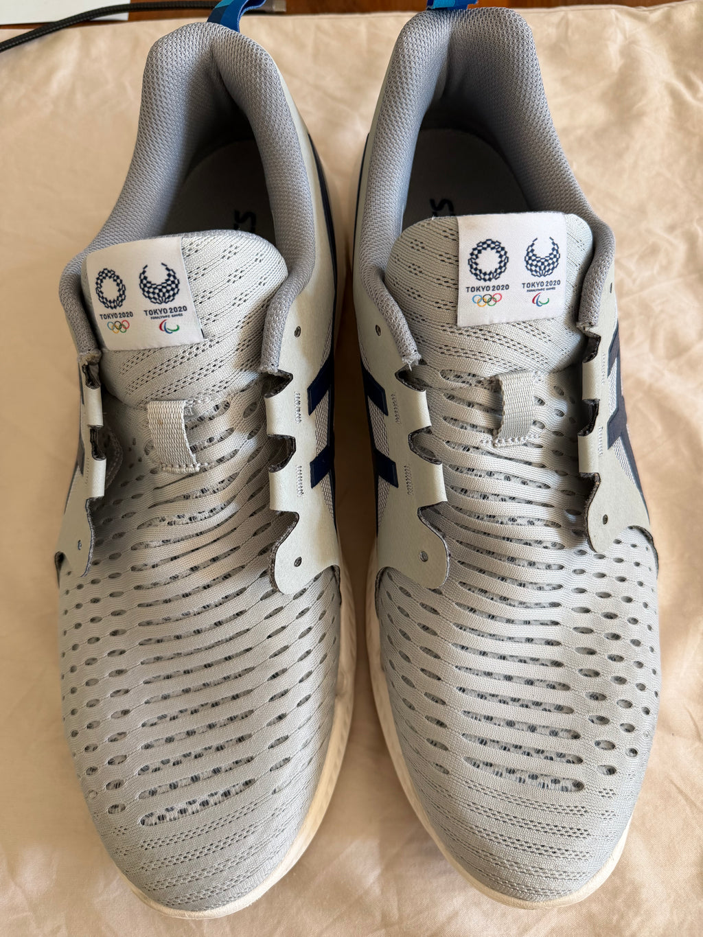 Pair of ASICS Tokyo 2020 trainers in grey from above