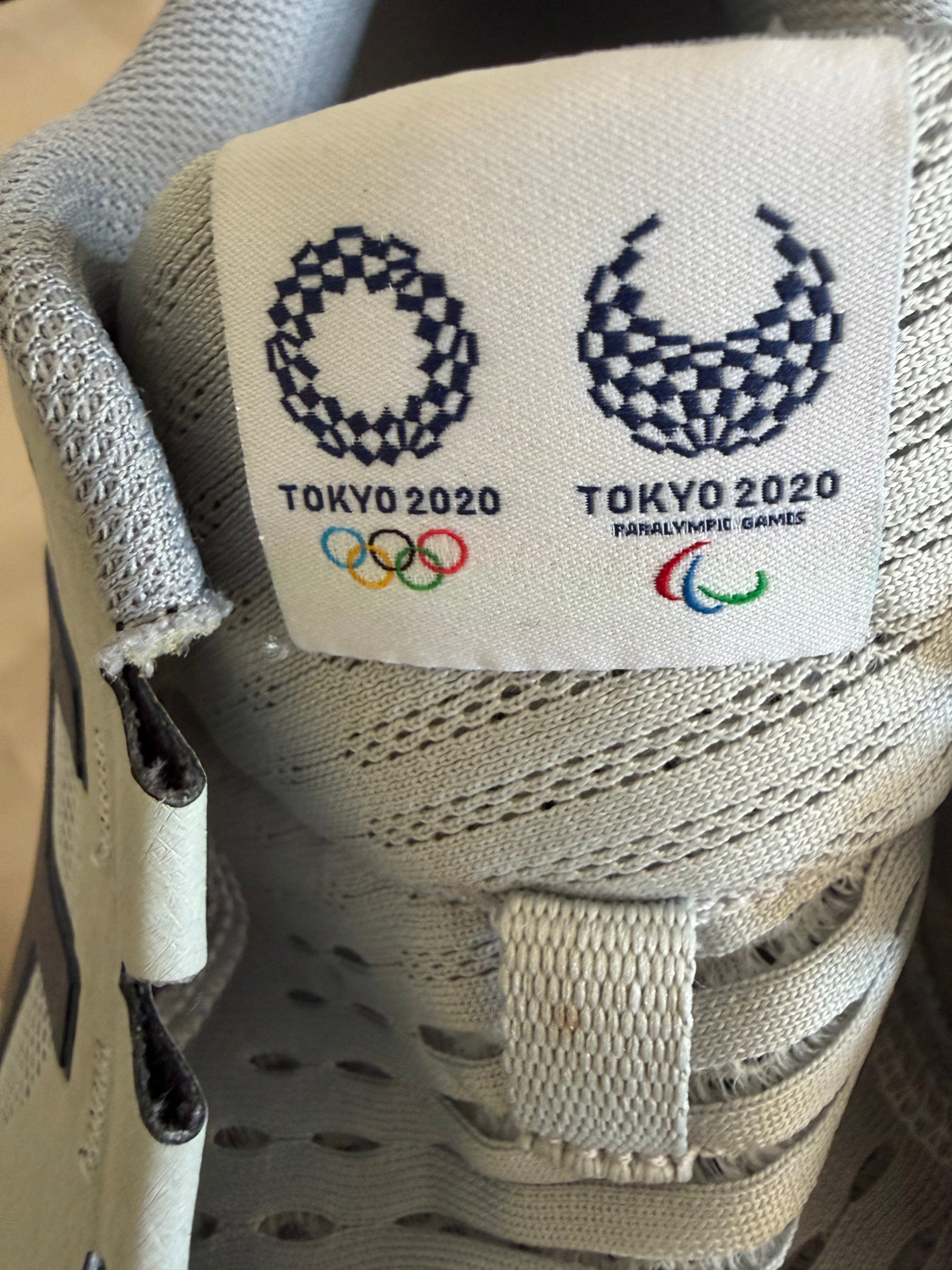 Close-up of ASICS Tokyo 2020 Olympics and Paralympic branding on trainer tongue