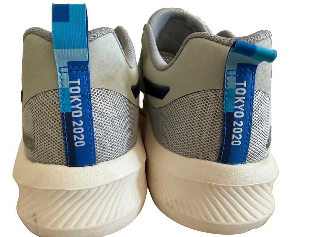 Back view of ASICS trainers with blue Tokyo 2020 heel pull tabs
