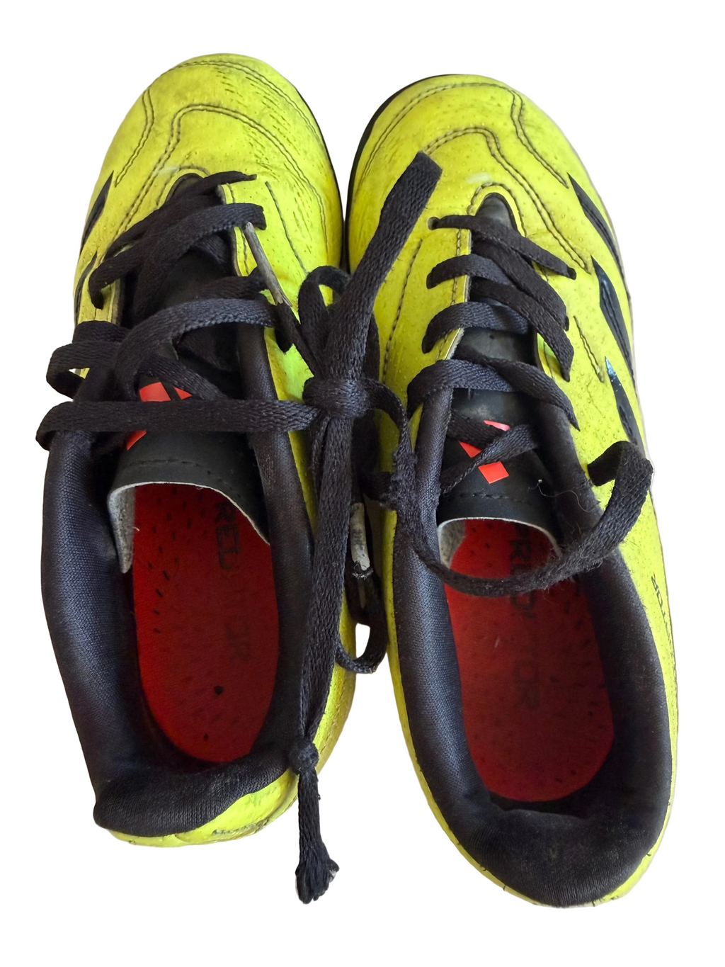 Pair of yellow and black adidas Predator football boots with laces viewed from above