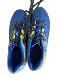 Pair of blue and grey Kipsta football boots with yellow accents, top view