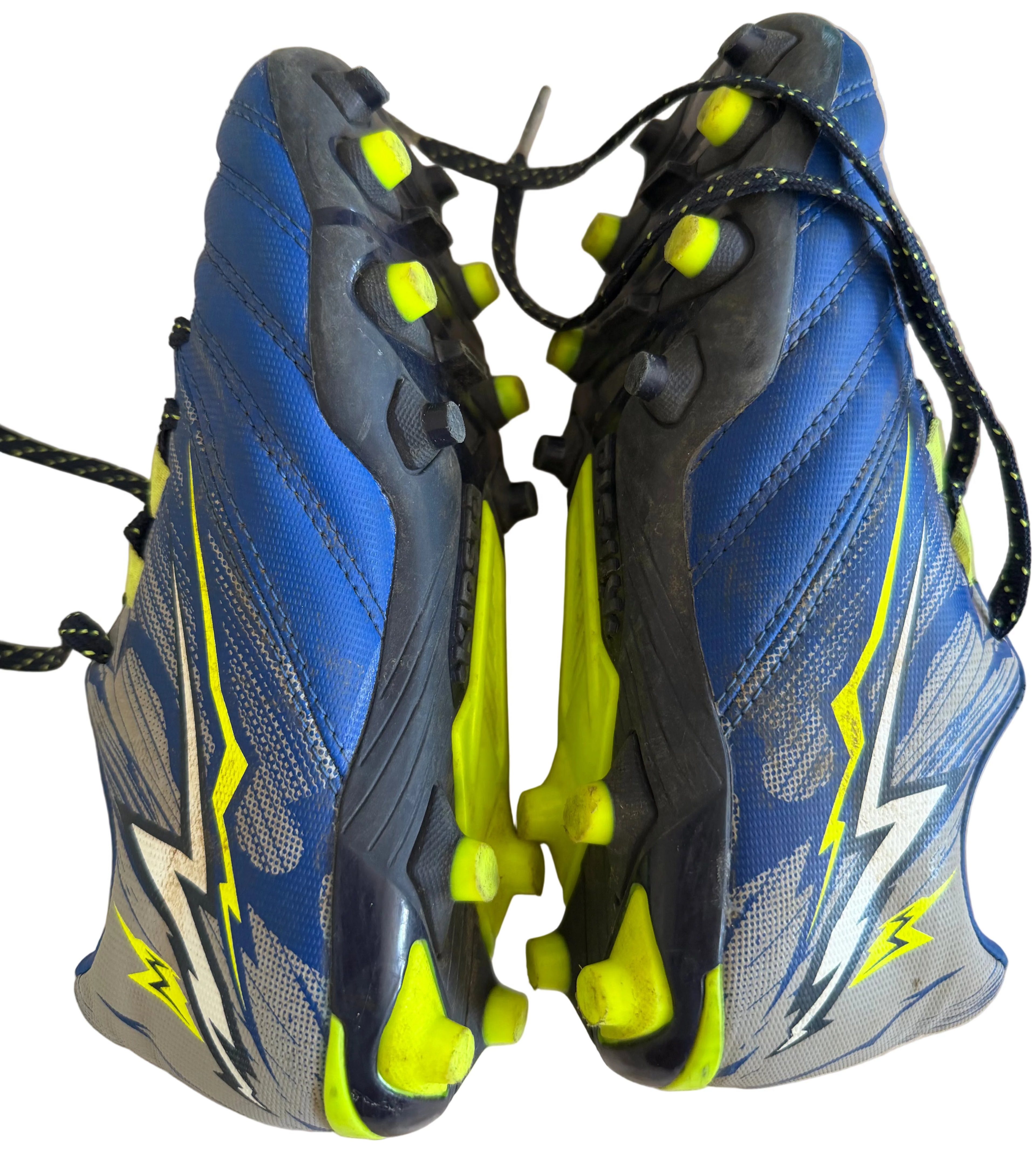 Side view of blue Kipsta football boots showing yellow studs and pattern