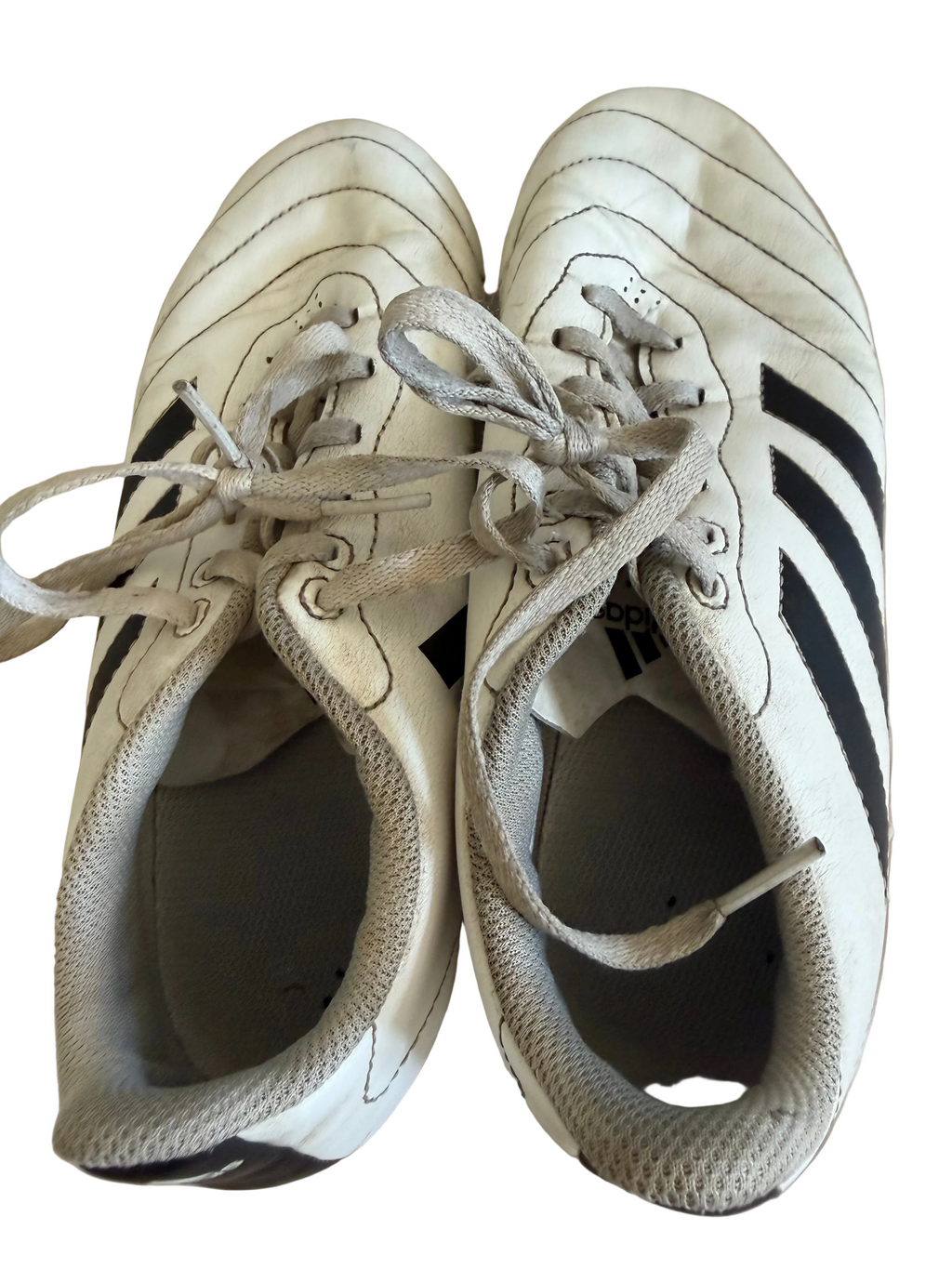 Pair of adidas white football boots with black stripes, top view