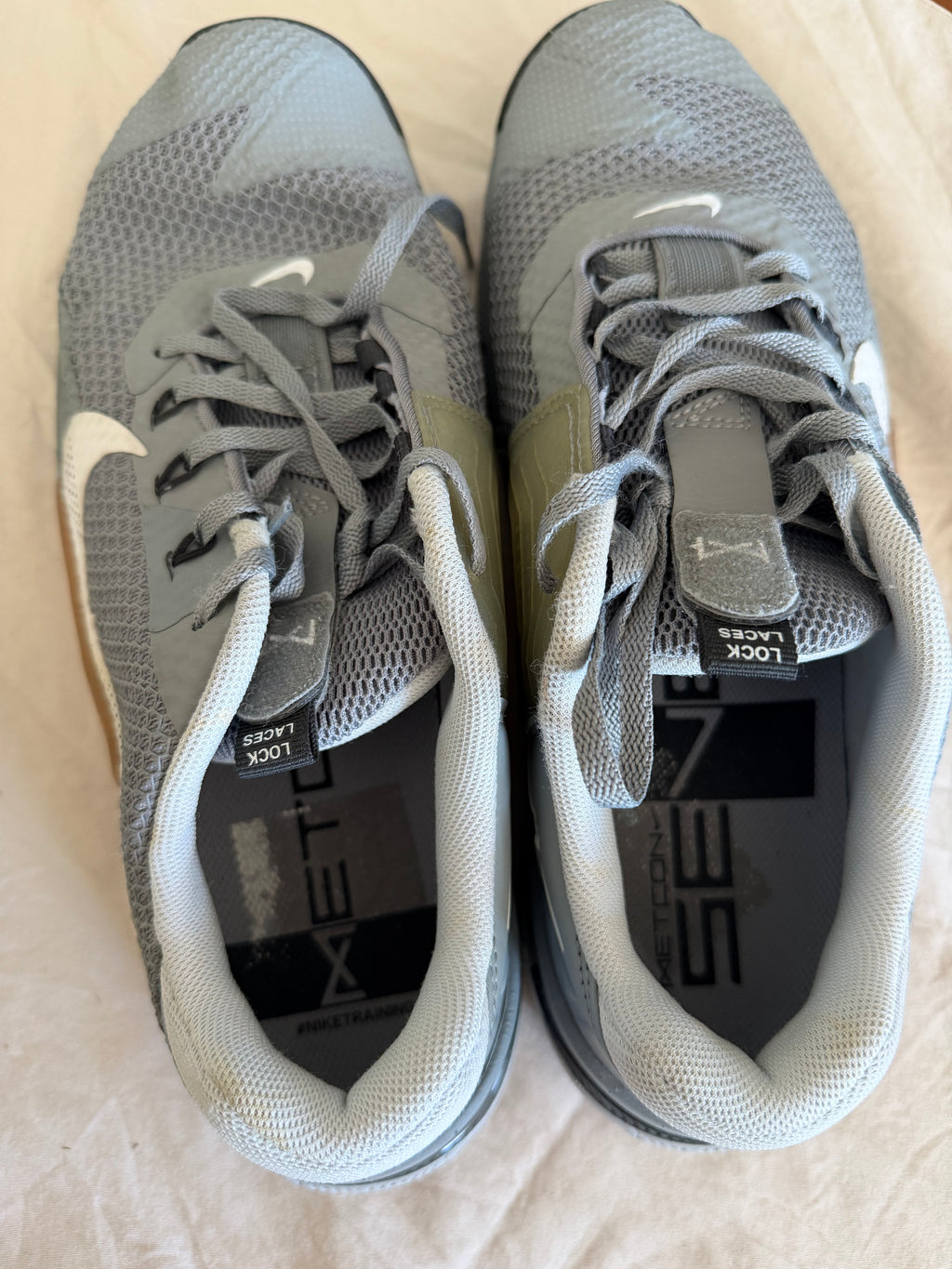 Pair of Nike Metcon 7 trainers in grey with lock laces, top view