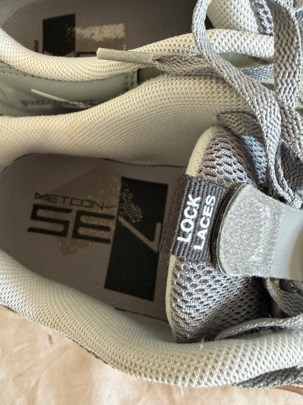 Close up of Nike Metcon 7 trainer with lock laces and branded insole