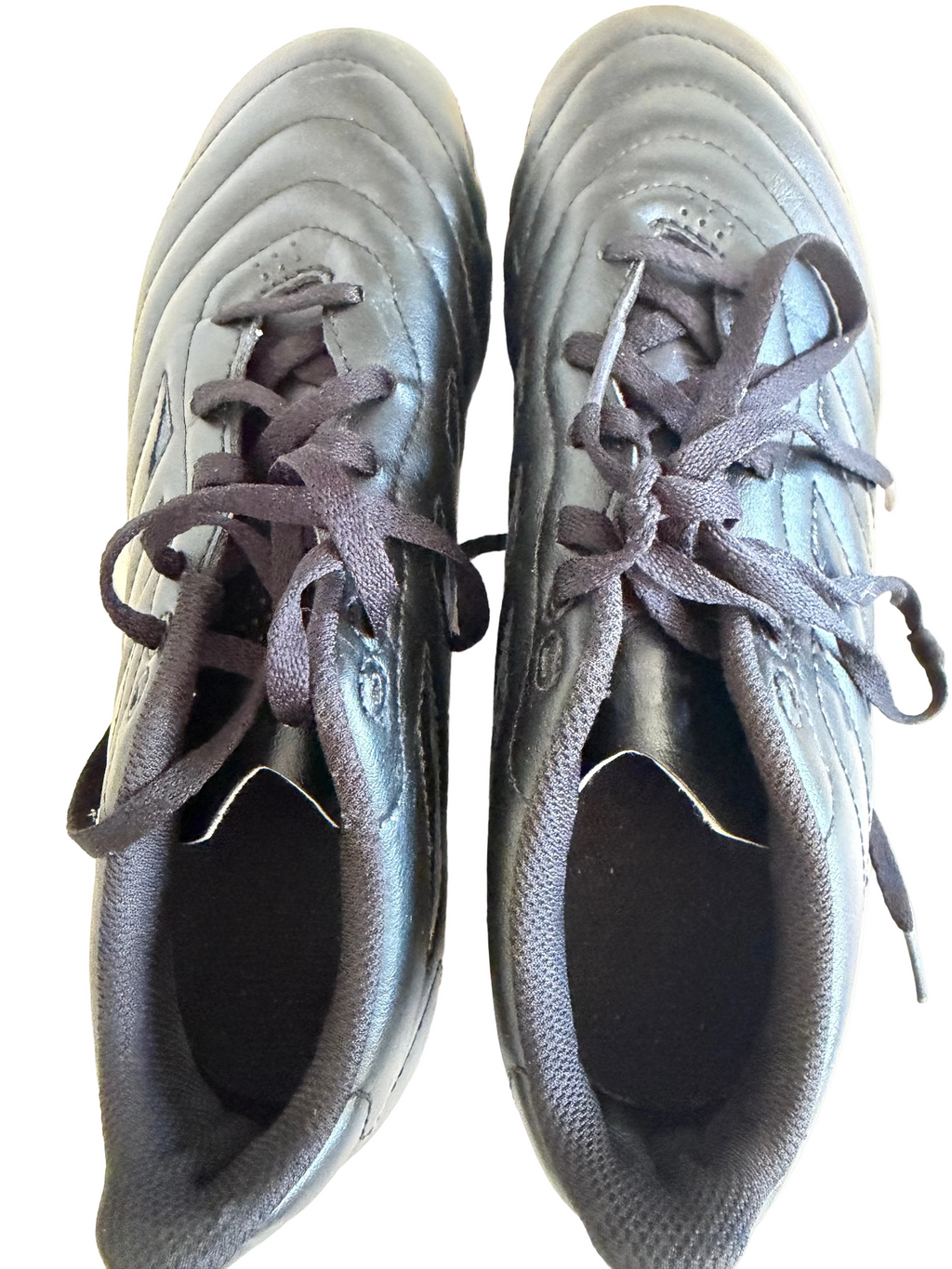 Pair of black adidas football boots with laces top view