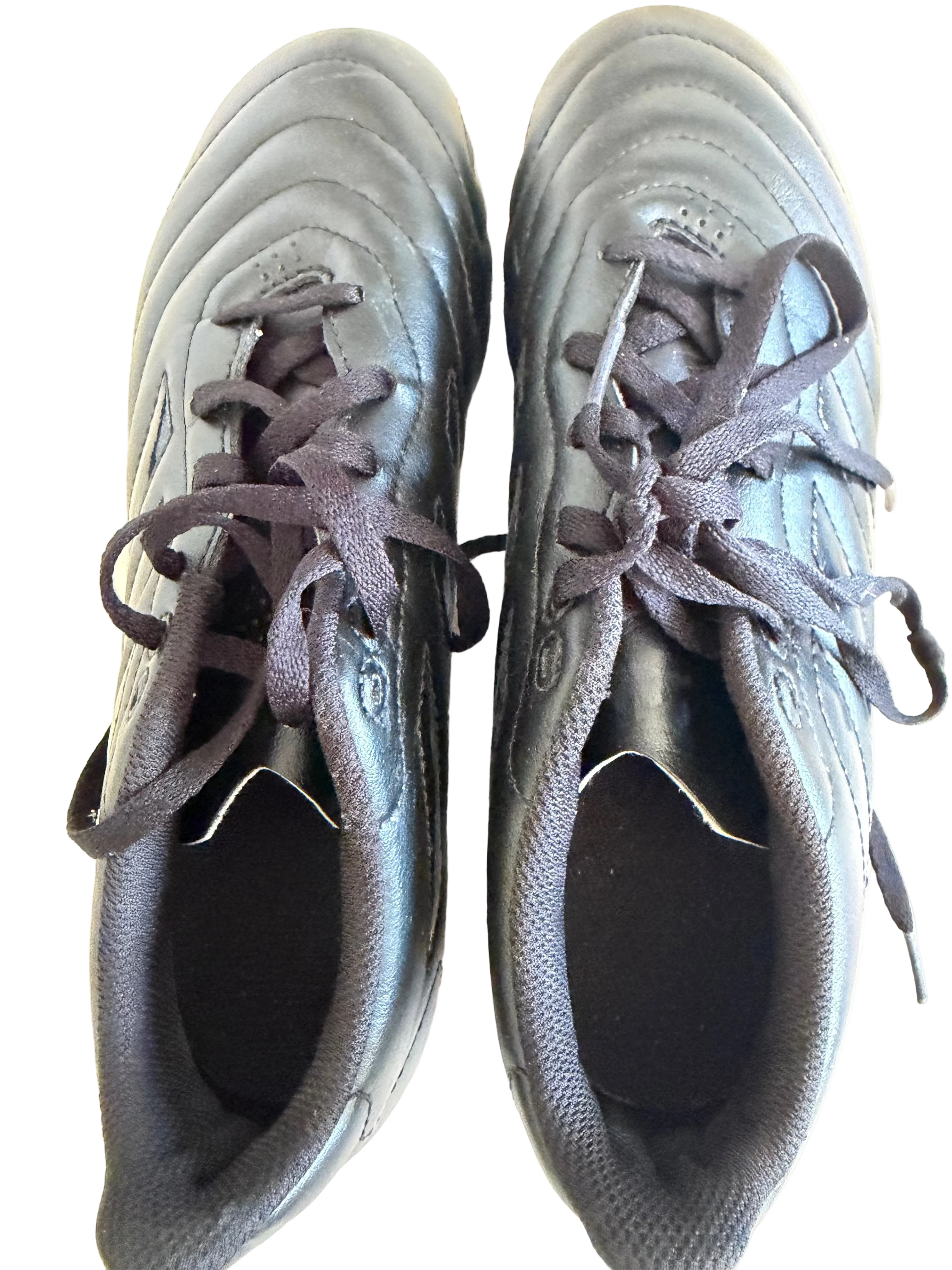 Pair of black adidas football boots with laces top view