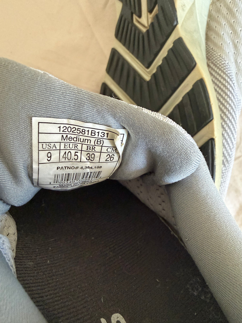 Size label inside Brooks Levitate trainer showing UK 9