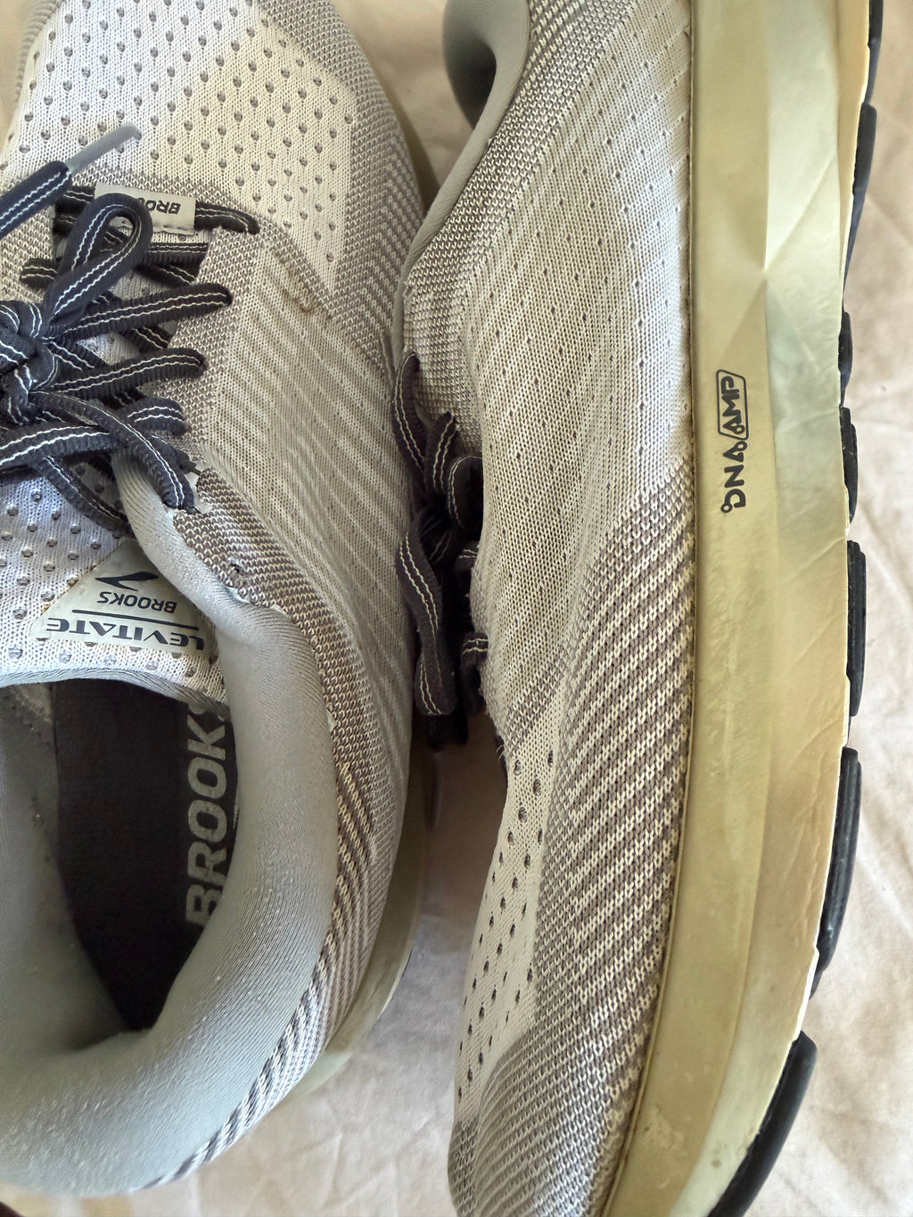 Brooks Levitate trainers in grey with DNA AMP sole
