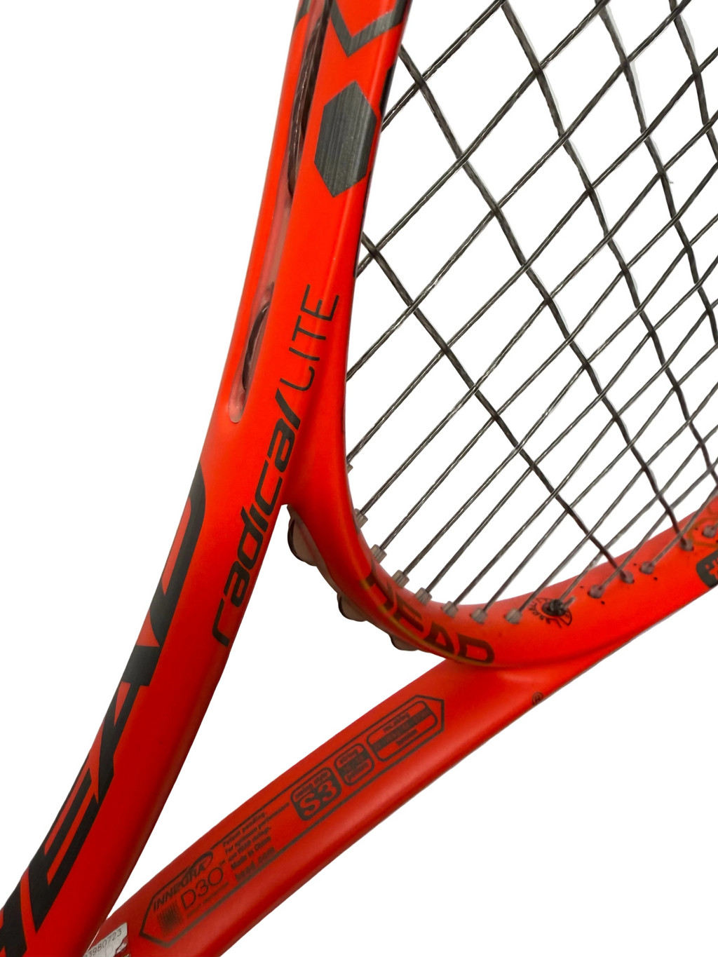 Close-up of Head Radical Lite branding and string pattern