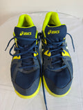 Pair of ASICS navy and yellow sports trainers viewed from above