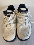 Pair of Prince trainers in white and navy viewed from above