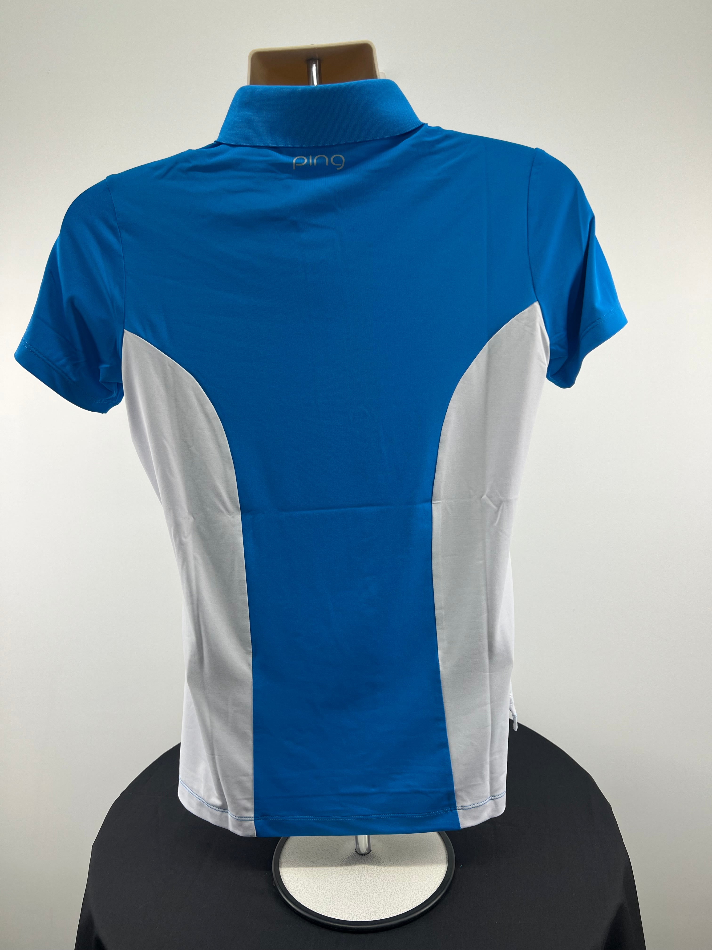 Back view of Women's Ping Solheim Cup 2024 Golf Polo in euro blue and white