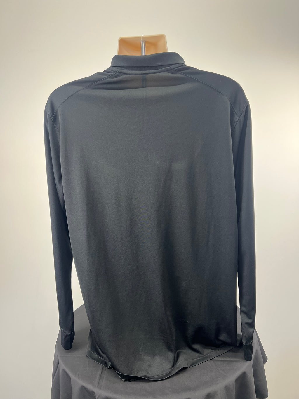 Back view of black Nike men's long sleeve golf polo in size XL