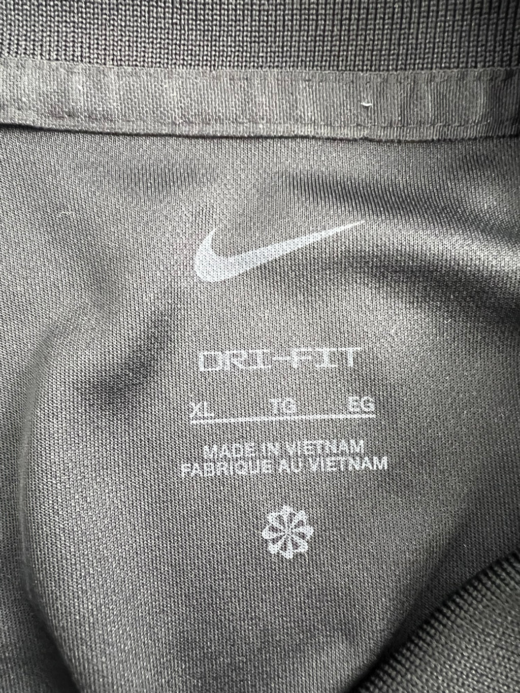 Close-up of the interior label showing Nike Dri-FIT XL details