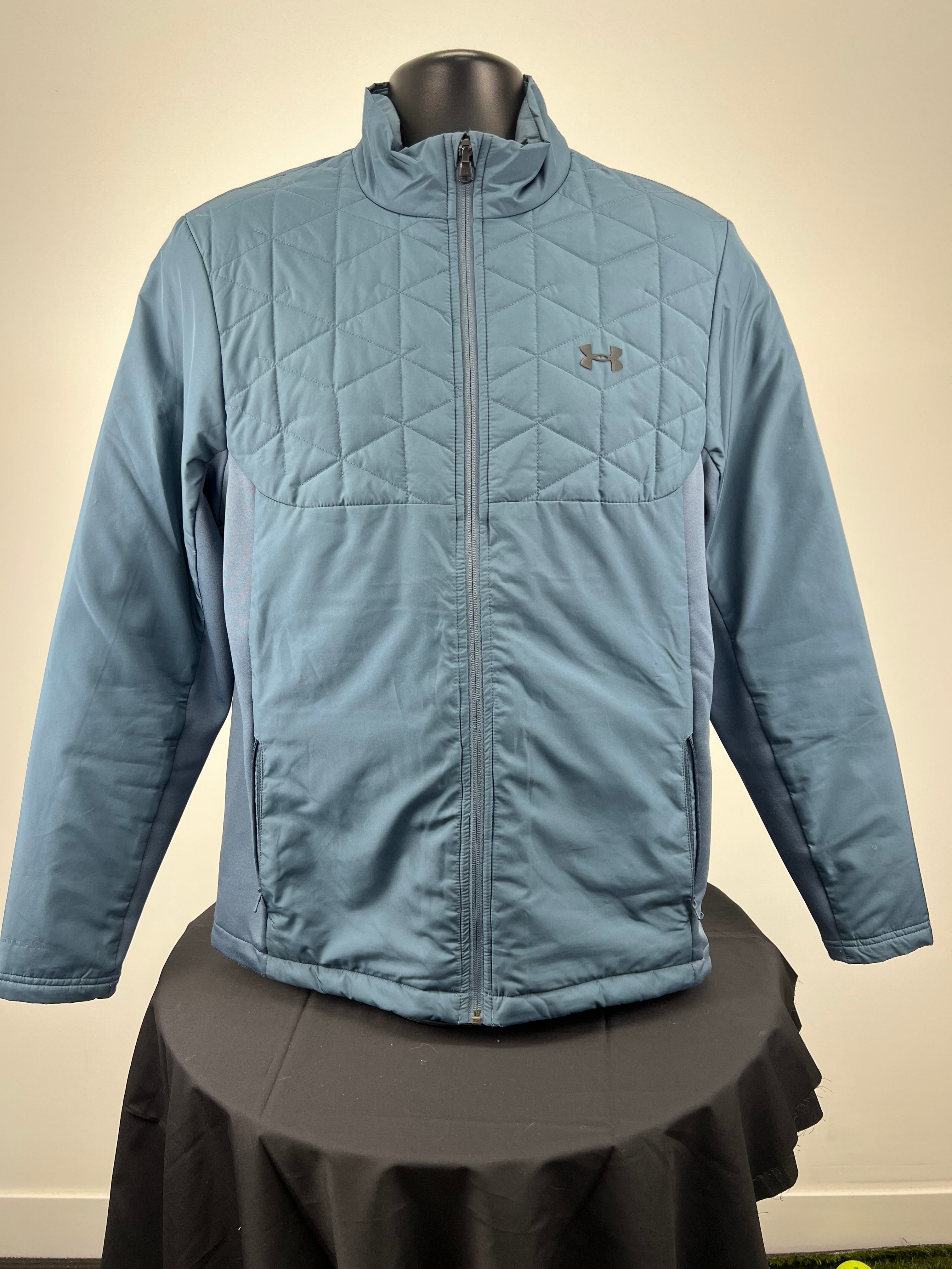 Front view of aqua Under Armour ColdGear Reactor men's jacket with quilted chest