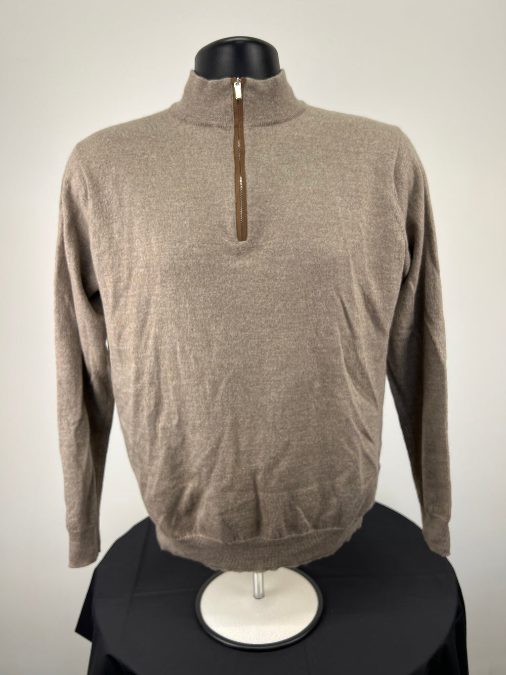Front view of men’s Peter Millar light taupe merino wool jumper with 1/4 zip and leather trim