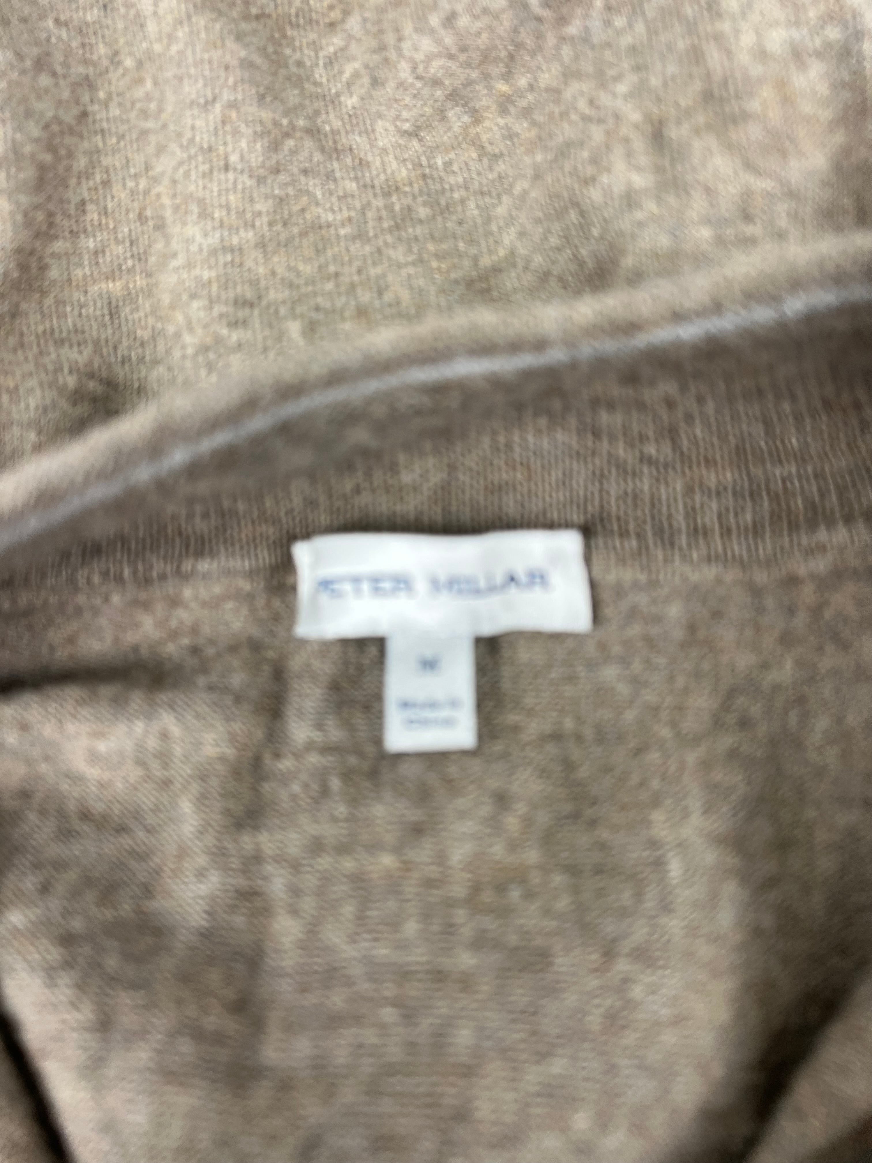 Close up of Peter Millar jumper neck label showing size medium and made in China