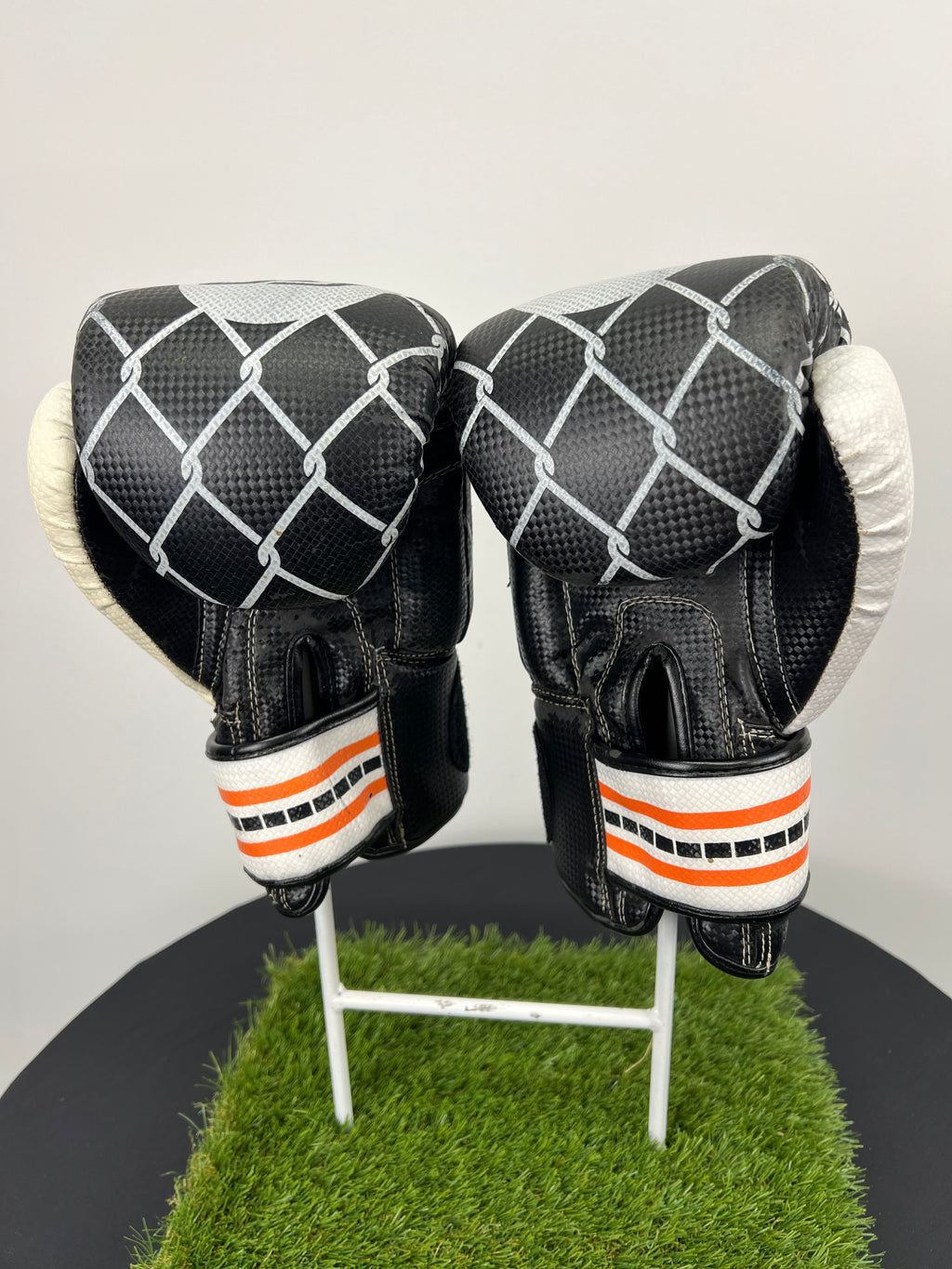Back view of Sport EQ boxing gloves showing padded knuckles and wrist strap design