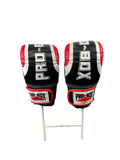 Front view of Pro Box boxing gloves size medium in black, red and white with bold 'PRO-BOX' print