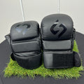 Front view of Sakuri Sport CB2 large size black grappling gloves with protective knuckle padding and wrist strap